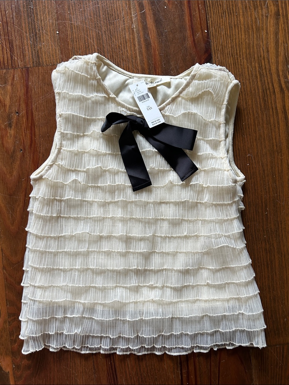 Anthropologie Blue tassel Cream Ruffle top with Black Bow - XXS NWT!